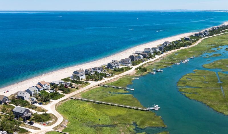 drone view of the beach and marsh