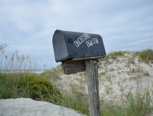 Mailbox in sand dunes